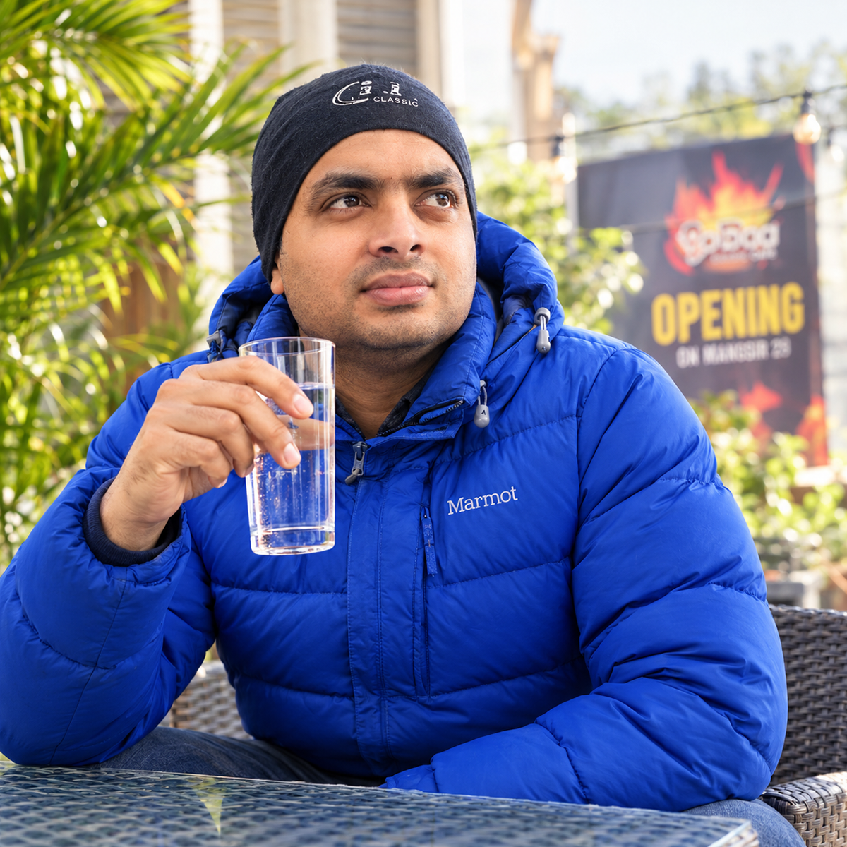 Bibhash Karn : Thoughtful Café Moment with Blue Jacket